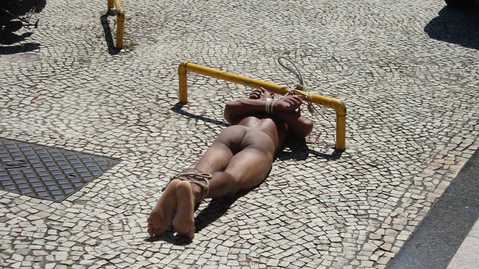 Nude black girl lying on guy